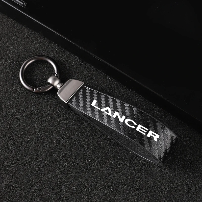 הרכב סיבי פחמן עור חבל Keychain מפתח טבעת עבור מיצובישי לנסר אביזרי רכב התמונה 1
